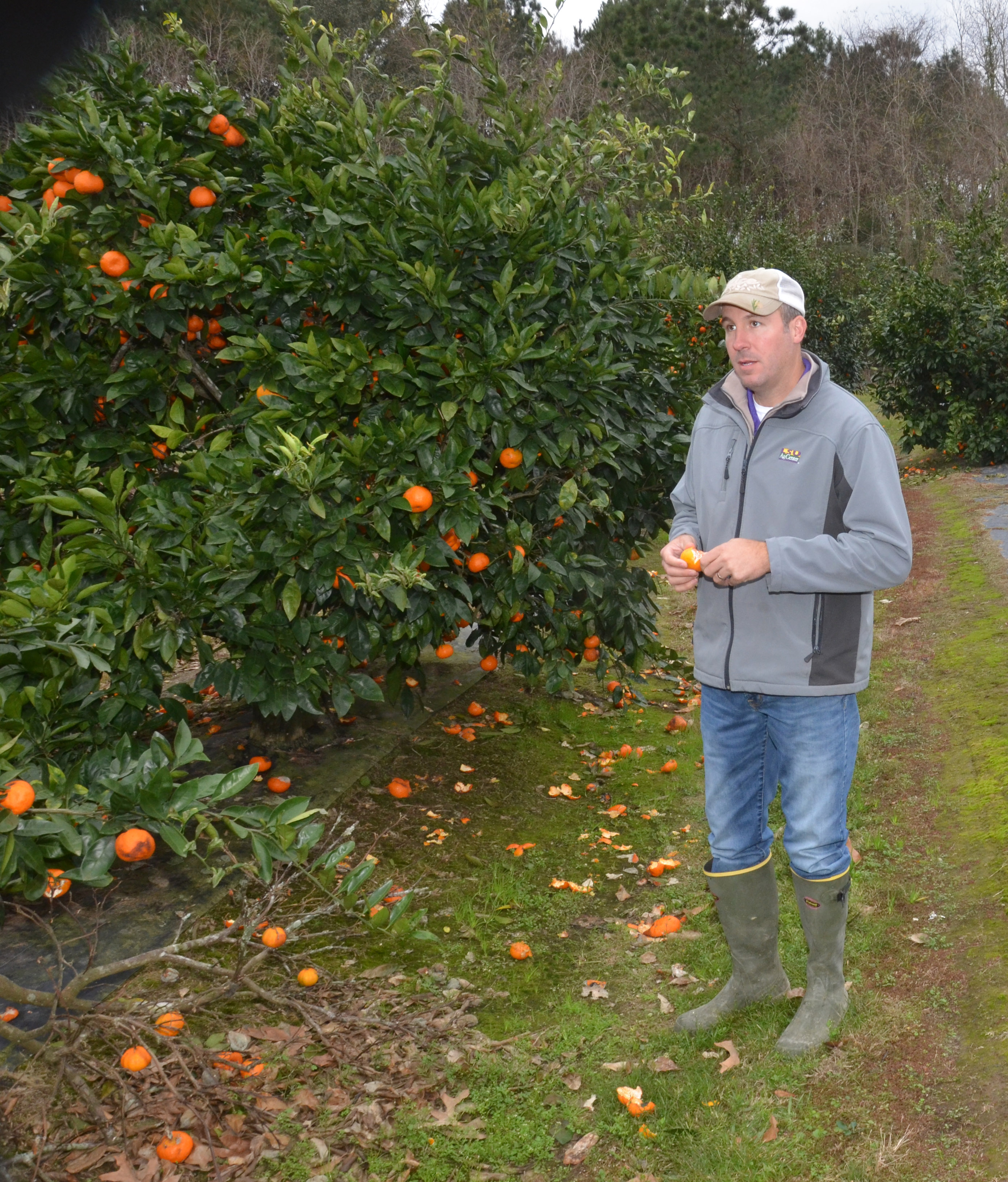 Jeremy Hebert with fruit trees.jpg thumbnail